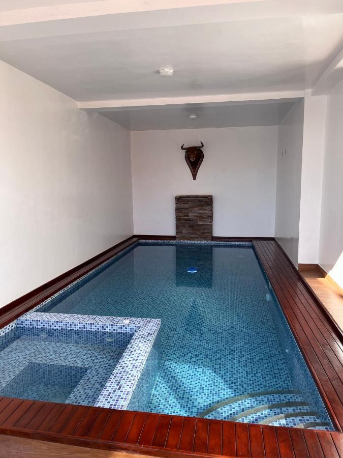 Mi Margarita Chalets Alausí المظهر الخارجي الصورة